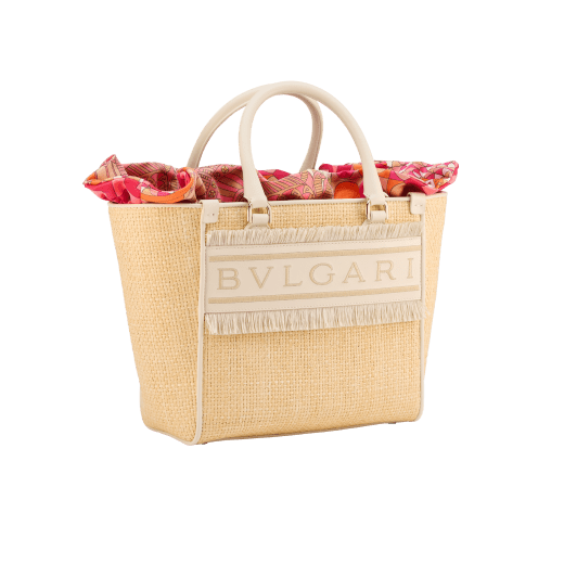 Bulgari Logo medium tote bag in beige raffia with ivory opal calf leather details, beige raffia fringes and beetroot spinel fuchsia nappa leather lining. Iconic Bulgari logo stitched motif, detachable satin satchel with multicoloured print outside and beetroot spinel fuchsia inside, and drawstring closure with captivating snakeheads in light gold-plated brass. 292073 image 9