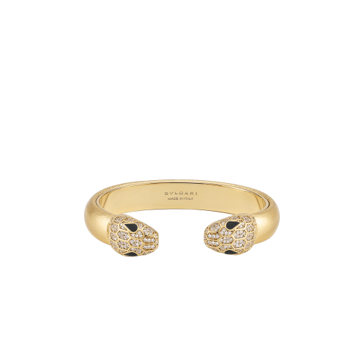 Serpenti Forever bangle bracelet in gold-finished brass with soft gold nappa leather inserts. Captivating contraire snakehead motif in gold-finished brass embellished with pavé-set white zirconia stones and black enamel eyes. BRACLT-SP-CONTR-softnappa image 1