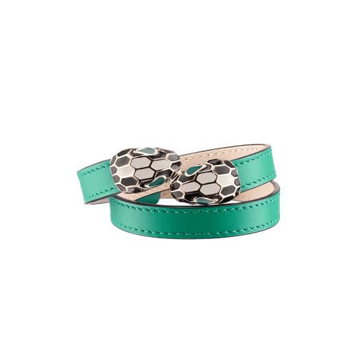 Serpenti Forever two-coil bracelet in emerald green calf leather. Captivating single-rivet contraire snakehead closure in light gold-plated brass embellished with black and white agate enamel scales and green enamel eyes. MCSerp-CL-EG image 1
