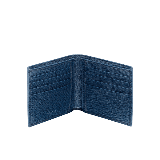BULGARI BULGARI Man hipster compact wallet in denim sapphire blue grain calf leather with Roman garnet burgundy moire silk internal details. Iconic palladium plated-brass décor and folded closure. BBM-WLT-HIPST-8Ca image 2