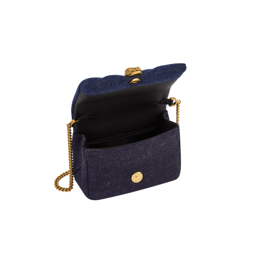 Serpenti Cabochon micro bag in ivory opal calf leather with a maxi matelassé pattern and black nappa leather lining. Captivating snakehead closure in gold-plated brass embellished with red enamel eyes. SCB-NANOCABOCHONa image 2