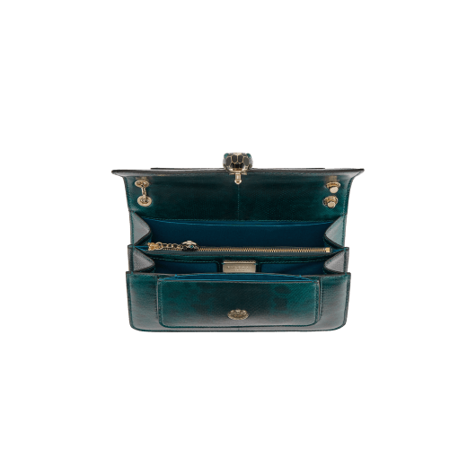 “Serpenti Forever” shoulder bag in Lavender Amethyst lilac calf leather with Reef Coral red grosgrain inner lining. Iconic snakehead closure in light gold-plated brass enhanced with black and white agate enamel and green malachite eyes. 1077-CLb image 4