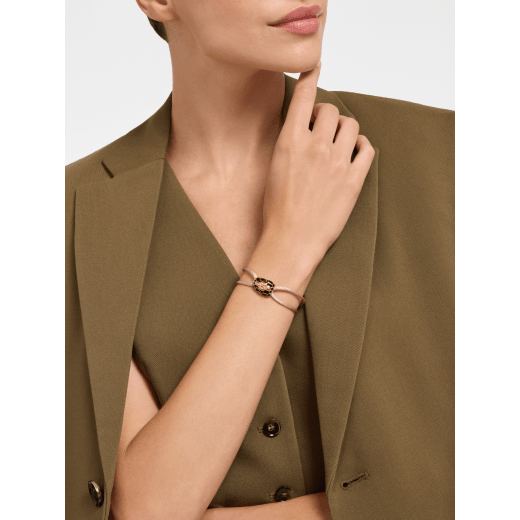 "Serpenti Forever" bracelet in Midnight Sapphire blue fabric with an alluring snakehead décor in light gold-plated brass enamelled in black and glittery Hawk's Eye grey, with seductive black enamel eyes. SERP-STRINGd image 1