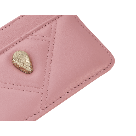 Serpenti Cabochon card holder in sheer amethyst lilac calf leather with a maxi quilted pattern and watercolour opal light blue nappa leather lining. Captivating snakehead rivet in gold-plated brass embellished with red enamel eyes. SCB-CCHOLDERa image 4