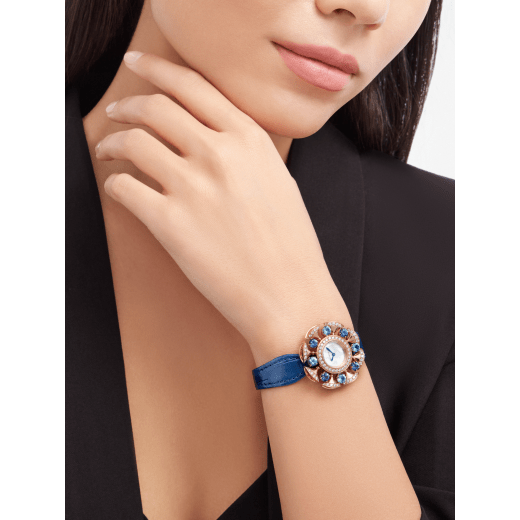 DIVAS' DREAM watch with 18 kt rose gold case set with round brilliant-cut diamonds, topazes and tanzanites, white mother-of-pearl dial and blue alligator bracelet. Water-resistant up to 30 meters. 103752 image 1