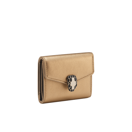 Serpenti Forever slim compact wallet in emerald green calf leather with black nappa leather interior. Captivating snakehead press button closure in light gold-plated brass embellished with black and white agate enamel scales and black onyx eyes. SEA-SLIMCOMPACT-Clb image 1