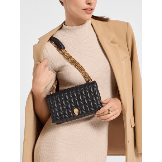 Serpenti Sugarloaf shoulder bag in black calf leather with a distinctive Calla Matelassé motif and black nappa leather lining. Captivating snakehead magnetic closure in gold-plated brass embellished with red enamel eyes. SCB-001-1295S-CALF image 1