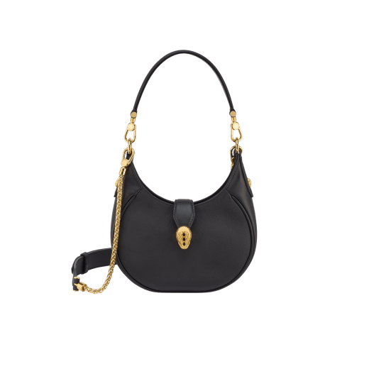 Serpenti Ellipse small crossbody bag in Urban grain and smooth ivory opal calf leather with flamingo quartz pink grosgrain lining. Captivating snakehead closure in gold-plated brass embellished with black onyx scales and red enamel eyes. 1204-UCL image 1