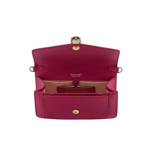 Serpenti Forever East-West small shoulder bag in primrose quartz pink calf leather, with heather amethyst pink grosgrain lining. Captivating magnetic snakehead closure in light gold-plated brass embellished with black and white agate enamel scales and black onyx eyes. 1237-Cla image 4