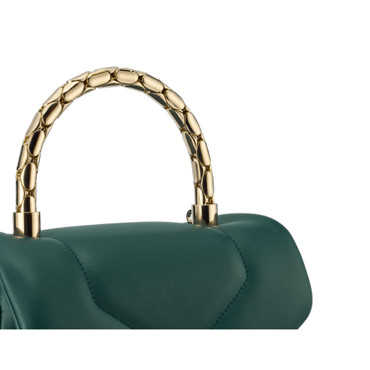 Serpenti Reverse small top handle bag in black quilted Metropolitan calf leather with black nappa leather lining. Captivating snakehead magnetic closure in gold-plated brass embellished with red enamel eyes. 1234-MCL image 5