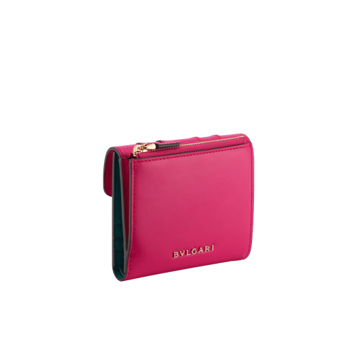 Serpenti Forever compact wallet in emerald green calf leather with violet amethyst nappa leather interior. Captivating snakehead press button closure in light gold-plated brass embellished with black and white agate enamel scales and green malachite eyes. SEA-WLT3FOLDCOMPb image 3