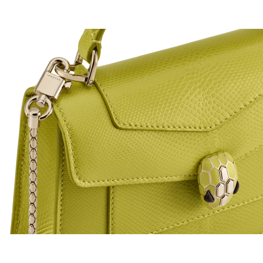 Serpenti Forever mini top handle bag in linden peridot yellowish green Pure karung skin with crystal rose pink nappa leather lining. Captivating snakehead magnetic closure in light gold-plated brass embellished with linden peridot yellowish green enamel and light gold-plated brass scales, and black onyx eyes. SEA-1283-EX image 5