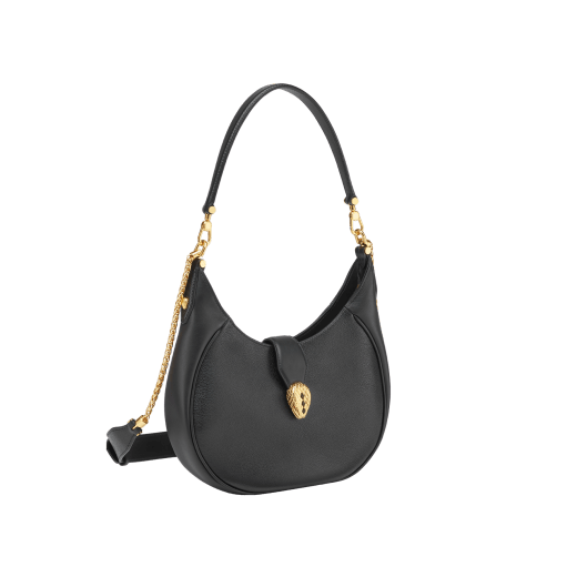 Serpenti Ellipse medium shoulder bag in Urban grain and smooth ivory opal calf leather with flamingo quartz pink gros grain lining. Captivating snakehead closure in gold-plated brass embellished with black onyx scales and red enamel eyes. 1190-UCL image 3