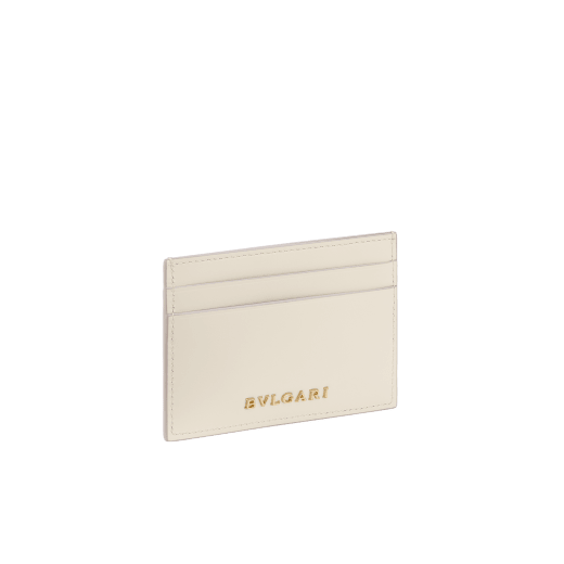Serpenti Forever card holder in light gold Striated calf leather. Captivating snakehead décor in light gold-plated brass embellished with champagne enamel and light gold-plated brass scales, and black enamel eyes. SEA-CC-HOLDER-R image 3