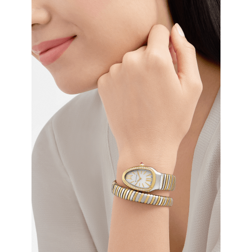 Serpenti Tubogas single-spiral watch with 18 kt yellow gold and stainless steel case set with diamonds, white opaline dial with guilloché soleil treatment and bracelet in 18 kt yellow gold and stainless steel. Water-resistant up to 30 metres 103648 image 1