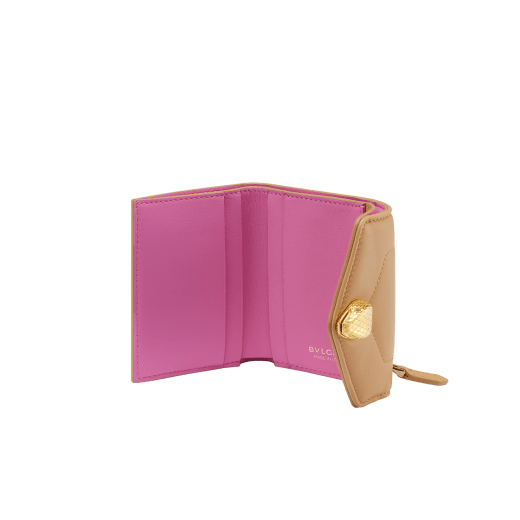 Serpenti Reverse compact wallet in Sahara amber light brown quilted Metropolitan calf leather with taffy quartz pink Metropolitan calf leather interior. Captivating snakehead press button closure in gold-plated brass embellished with red enamel eyes. SRV-COMPACTWLT image 2