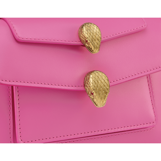 Alexander Wang x Bulgari small belt bag in azalea quartz pink calf leather with black nappa leather lining. Captivating double Serpenti head magnetic closure in antique gold-plated brass embellished with red enamel eyes. 292314 image 5