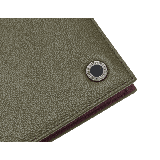 BULGARI BULGARI Man compact wallet in black Urban grain calf leather with forest emerald green Urban grain calf leather interior. Iconic dark ruthenium plated-brass décor enamelled in matte black, and folded closure. BBM-WLTITALASYMa image 4