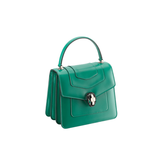 Serpenti Forever small top handle bag in white agate calf leather with heather amethyst fuchsia grosgrain lining. Captivating snakehead closure in light gold-plated brass embellished with black and white agate enamel scales and green malachite eyes. 1122-CLa image 2