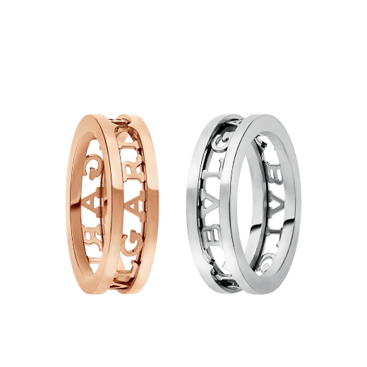 B.zero1 couples' rings in 18 kt white and rose gold with an openwork Bulgari logo. A distinctive ring set fusing visionary design with bold charisma. BZERO1-COUPLES-RINGS-8 image 1