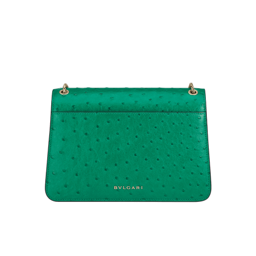 Serpenti Forever medium shoulder bag in vivid emerald green shiny ostrich skin with emerald green nappa leather lining. Captivating snakehead magnetic closure in light gold-plated brass embellished with black enamel and light gold-plated brass scales and black onyx eyes. 293263 image 3