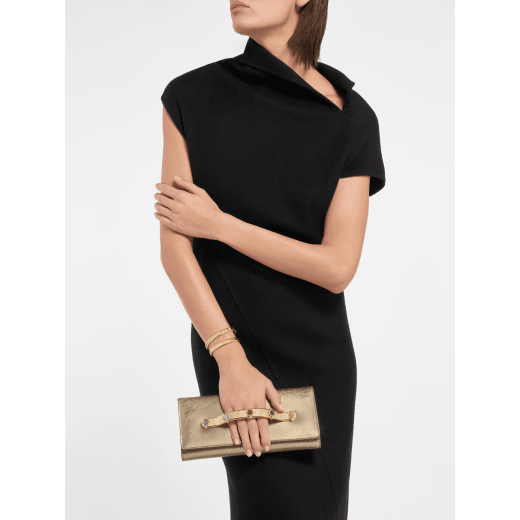 Bvlgari Tubogas Cabochon evening clutch in gold striated calf leather with crystal rose nappa leather lining. Iconic Tubogas handle in gold-plated brass embellished with coloured cabochon hard stones, zirconia and magnetic closure. 295471 image 1