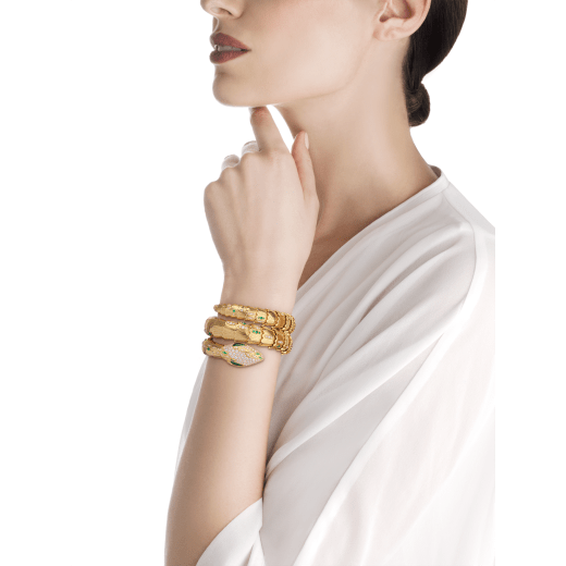 Serpenti Secret Watch with 18 kt yellow gold head set with brilliant cut diamonds, brilliant cut emeralds and malachite eyes, 18 kt yellow gold case, 18 kt yellow gold dial and double spiral bracelet, both set with brilliant cut diamonds and brilliant cut emeralds. 101999 image 2