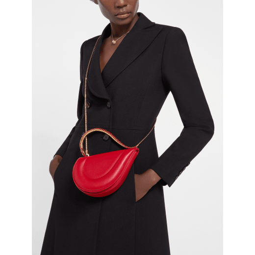 Serpenti Cuore 1968 top handle bag in perla white calf leather with perla white nappa leather lining. Captivating snake body-shaped top handle in gold-plated brass embellished with perla white and black enamel scales and zirconia eyes; press-button closure. SRN-001-1367S-r image 1