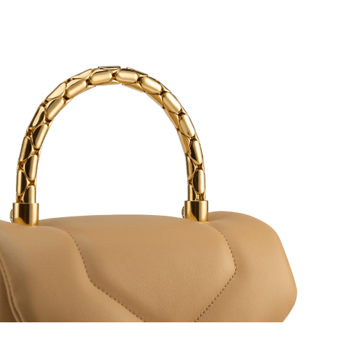 Serpenti Reverse small top handle bag in black quilted Metropolitan calf leather with black nappa leather lining. Captivating snakehead magnetic closure in gold-plated brass embellished with red enamel eyes. 1234-MCL image 5