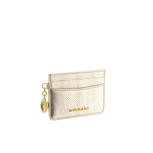 "Serpenti Forever" card holder in "Molten" light gold karung skin. New Serpenti head charm in gold-plated brass, finished with red enamel eyes. SEA-CC-HOLDER-MK image 1