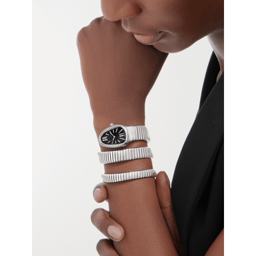 Serpenti Tubogas Lady watch, 35 mm stainless steel curved case and bezel set with diamonds, stainless steel crown set with a cabochon cut rubellite, black dial with guilloché soleil treatment and double spiral stainless steel bracelet. Quartz movement hours and minutes functions. Water proof 30 m. 103433 image 2