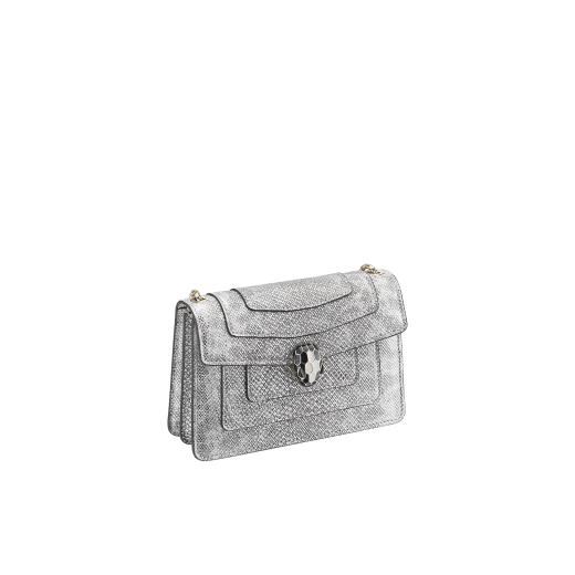 Serpenti Forever crossbody micro bag in milky opal metallic karung skin. Brass light gold plated tempting snake head closure in black and tone on tone glitter enamel, with black onyx eyes. 986-MK image 2