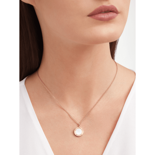 BULGARI BULGARI 18 kt rose gold necklace set with a mother-of-pearl insert and mandarin garnets on the pendant. 360054 image 1