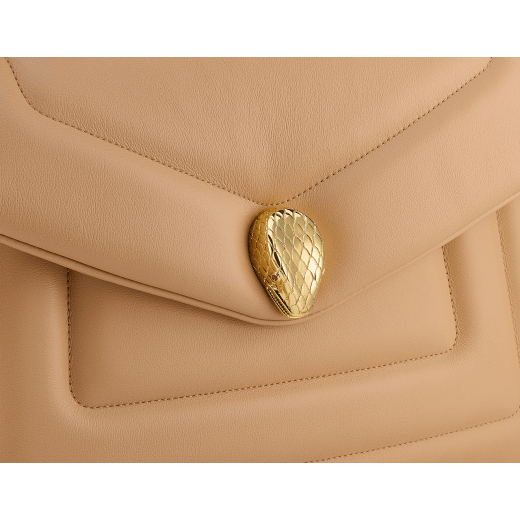Serpenti Reverse medium shoulder bag in Sahara amber light brown quilted Metropolitan calf leather with taffy quartz pink nappa leather lining. Captivating snakehead magnetic closure in gold-plated brass embellished with red enamel eyes. 1223-MCL image 5