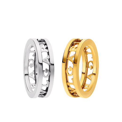 B.zero1 couples' rings in 18 kt white and yellow gold with an openwork Bulgari logo. A distinctive ring set fusing visionary design with bold charisma. BZERO1-COUPLES-RINGS-4 image 1