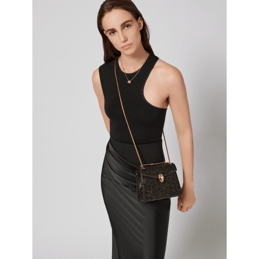 Serpenti Forever Day-to-Night small shoulder bag with black crystals inserts hand-set on suede leather with black nappa leather lining. Captivating snakehead magnetic closure in gold-plated brass embellished with black zirconia pavé and gold-plated brass scales, and black onyx eyes. 294042 image 2