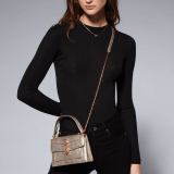 Alexander Wang x Bvlgari belt bag in light gold Molten karung skin with black nappa leather lining. Exclusively redesigned double Serpenti head clasp in antique gold-plated brass with seductive red enamel eyes. 291188 image 8