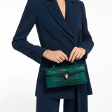 Serpenti Forever Elongated top handle bag in forest emerald shiny karung with black nappa leather lining. Captivating snakehead magnetic closure in gold-plated brass embellished with forest emerald enamel and gold-plated brass scales, and black onyx eyes. 295674 image 1