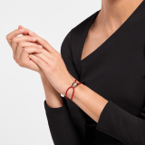 "Serpenti Forever" bracelet in Midnight Sapphire blue fabric with an alluring snakehead décor in light gold-plated brass enamelled in black and glittery Hawk's Eye grey, with seductive black enamel eyes. SERP-STRINGd image 2