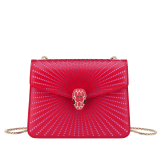 Serpenti Forever crossbody bag in ivory opal laser-cut calf leather with caramel topaz beige nappa leather lining. Captivating snakehead closure in light gold-plated brass embellished with matte and shiny ivory opal enamel scales and black onyx eyes. 422-LCL image 1