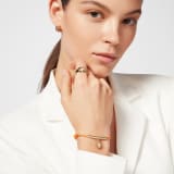 Serpenti Forever bracelet in coral carnelian orange fabric. Light gold-plated brass tubular element and captivating snakehead charm embellished with red enamel eyes. SERP-HERMINISTRING image 2
