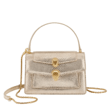 Alexander Wang x Bvlgari belt bag in light gold Molten karung skin with black nappa leather lining. Exclusively redesigned double Serpenti head clasp in antique gold-plated brass with seductive red enamel eyes. 291188 image 1
