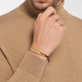 BVLGARI BVLGARI 繩帶手環,採用黑色繩帶。經典金色銘牌鐫刻 BVLGARI 標誌。 BVLGARISTRING image 1