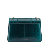 “Serpenti Forever” shoulder bag in Lavender Amethyst lilac calf leather with Reef Coral red grosgrain inner lining. Iconic snakehead closure in light gold-plated brass enhanced with black and white agate enamel and green malachite eyes. 1077-CLb image 3
