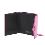 Serpenti Forever slim compact wallet in azalea quartz pink coated calf leather with black calf leather interior. Captivating snakehead press stud closure in rose gold-plated brass embellished with matt azalea quartz pink enamel scales and black onyx eyes. SEA-SLIMCOMPACT-VCLa image 2