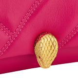 Serpenti Cabochon micro bag in ivory opal calf leather with a maxi matelassé pattern and black nappa leather lining. Captivating snakehead closure in gold-plated brass embellished with red enamel eyes. SCB-NANOCABOCHONa image 4