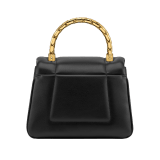 Serpenti Reverse small top handle bag in black quilted Metropolitan calf leather with black nappa leather lining. Captivating snakehead magnetic closure in gold-plated brass embellished with red enamel eyes. 1234-MCL image 3