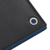 BULGARI BULGARI Man hipster compact wallet in soft, full grain black calf leather with Mediterranean lapis blue nappa leather interior. Iconic palladium-plated brass embellishment with midnight sapphire blue enamel, and folded closure. 293119 image 4
