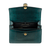 Serpenti Forever medium top handle bag in forest emerald shiny karung with black nappa leather lining. Captivating snakehead magnetic closure in gold-plated brass embellished with forest emerald enamel and gold-plated brass scales, and black onyx eyes. 295626 image 3