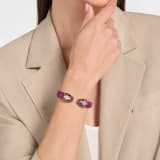 Serpenti Forever bangle bracelet in palladium-plated brass with midnight plum Pure karung inserts. Captivating contraire snakehead motif embellished with burgundy and white enamel scales, and black enamel eyes. BRAC-CONTR-PUREKAR image 1
